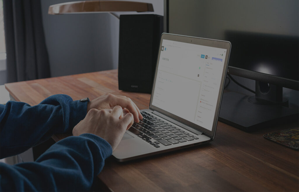 laptop on a desk in