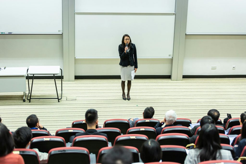 Teacher stands in front of classroom